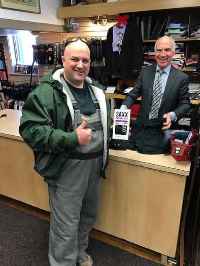 Mr. Luke Tower purchasing a pair of Saxx underwear from store owner, Robert Mansour.