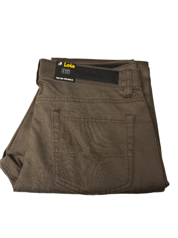 Folded brown pants with a label on a white surface